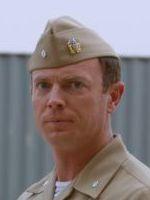Matthew Bellows (Navy Commander Brian James)